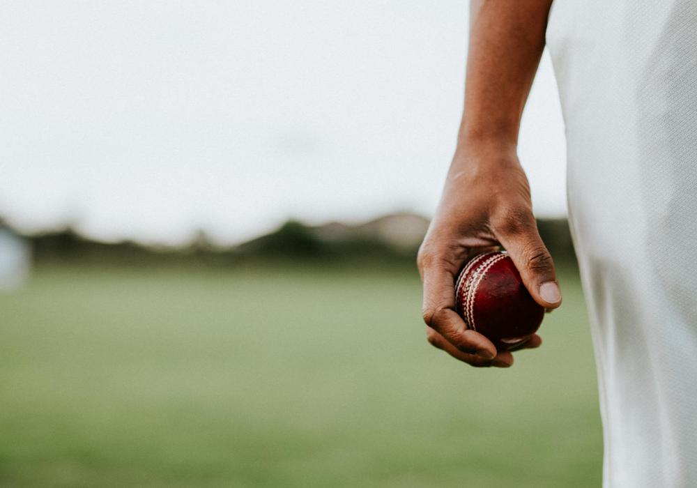 Cricket player holding cricket ball